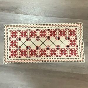 Ukrainian “Veshechya” hand embroidered table linen in traditional colours.